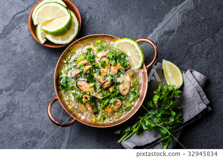 Peruvian food. Mussels ceviche. Cold soup with 32945834