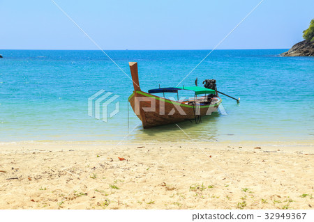 Tropical beach, traditional long tail boats 32949367