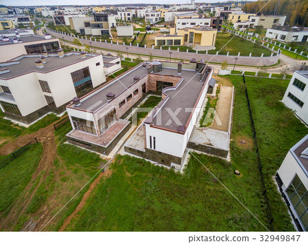 Modern country houses under construction 32949847