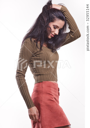 brunette woman portrait in autumn color. Studio shoot brunette woman portrait in autumn color. Studio shoot 32955144
