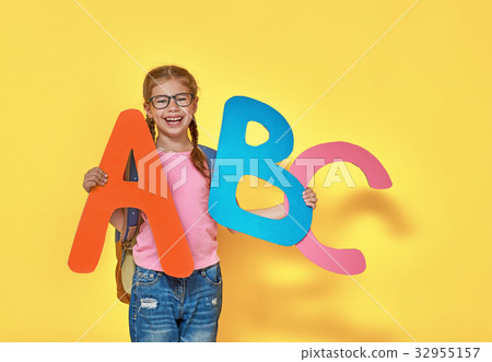 child with big letters child with big letters 32955157