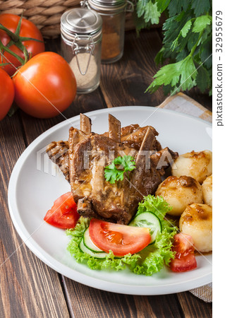 Pork spareribs served with silesian noodles 32955679
