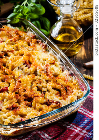 Casserole fusilli pasta with sausage 32955688