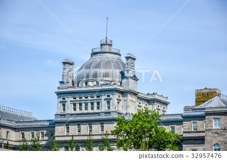 An old historical building with the large windows  32957476