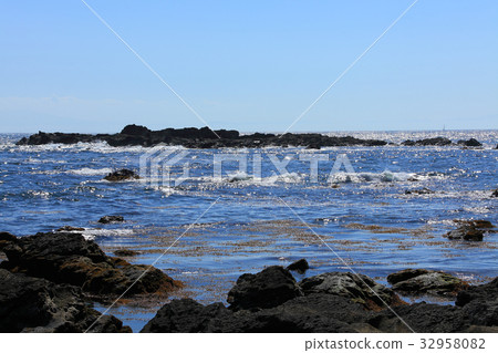 Rugged rocky castle island 32958082