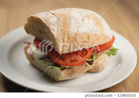 ciabatta sandwich with speck, mozzarella and 32960858