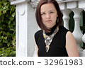 Portrait of a young woman on the street 32961983