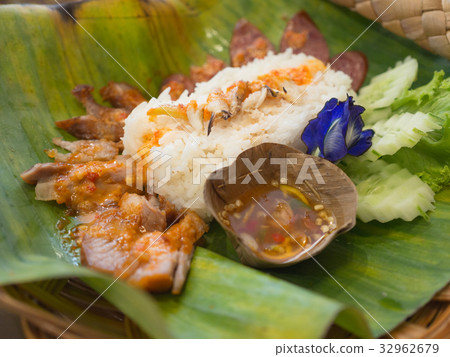 Crab and Barbecued red pork in sauce with rice Crab and Barbecued red pork in sauce with rice 32962679