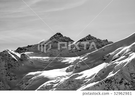 Black and white view on winter mountains with snow Black and white view on winter mountains with snow 32962981