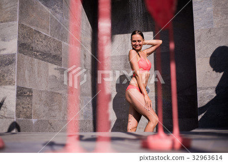 Shower On Beach. Two Beautiful Fit Woman Taking 32963614