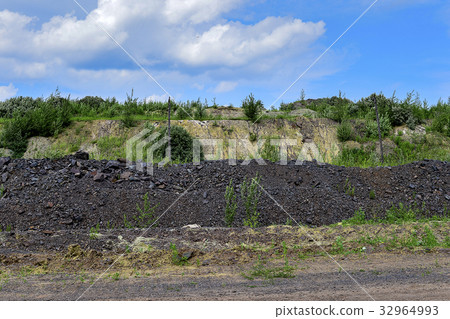 Production area with road and rocks Production area with road and rocks 32964993