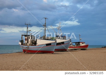 Fishing boat at Thorup Beach, Denmark. Fishing boat at Thorup Beach, Denmark. 32965105