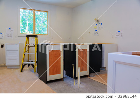 Custom kitchen cabinets in various stages Custom kitchen cabinets in various stages 32965144