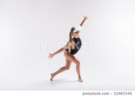 Somber youthful lady repeating action watching Somber youthful lady repeating action watching 32965548