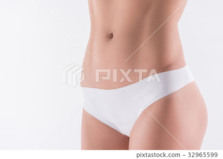 Youthful fit girl wearing comfy underclothing 32965599