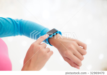 Woman use of smart watch Woman use of smart watch 32969470