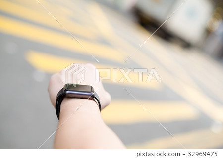 Man with smart watch Man with smart watch 32969475