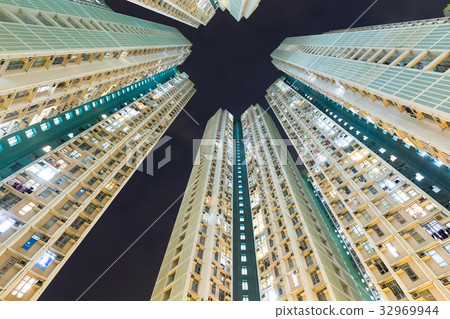 Apartment building to the sky at night Apartment building to the sky at night 32969944