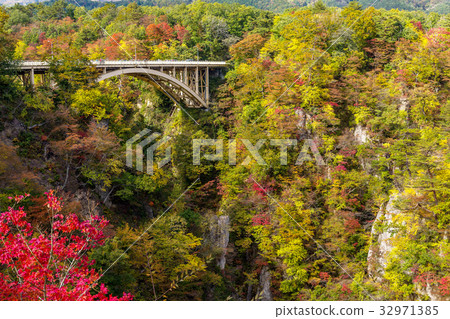 Bridge passing though Naruko Gorge in autumn Bridge passing though Naruko Gorge in autumn 32971385