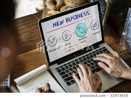 Hands working on laptop network graphic overlay Hands working on laptop network graphic overlay 32973658