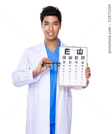 Optician holding with eye chart and glasses Optician holding with eye chart and glasses 32975204