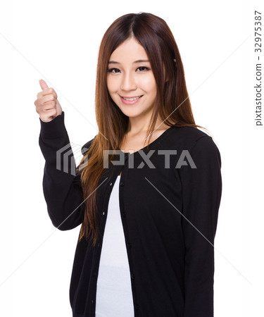 Woman with thumb up 32975387