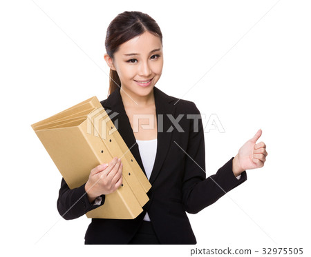 Young businesswoman hold with folder and thumb up Young businesswoman hold with folder and thumb up 32975505