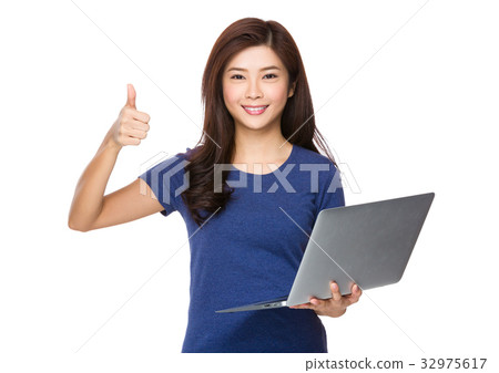 Young woman hold with notebook and thumb up 32975617
