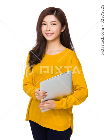Asian woman hold with laptop computer Asian woman hold with laptop computer 32975625