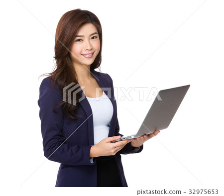 Young asian businesswoman use of the laptop computer Young asian businesswoman use of the laptop computer 32975653