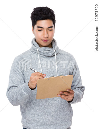 Man write on clipboard Man write on clipboard 32975790