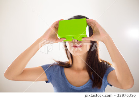 Woman happy looking with virtual reality Woman happy looking with virtual reality 32976350
