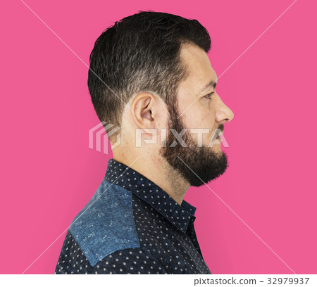 Man standing and posing for photoshoot Man standing and posing for photoshoot 32979937