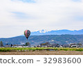 Mountains and balloons 32983600