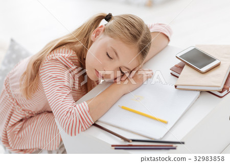 Young lady having nap after creating new Young lady having nap after creating new 32983858