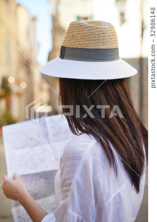 travel guide, tourism in Europe, woman tourist with map travel guide, tourism in Europe, woman tourist with map 32986148
