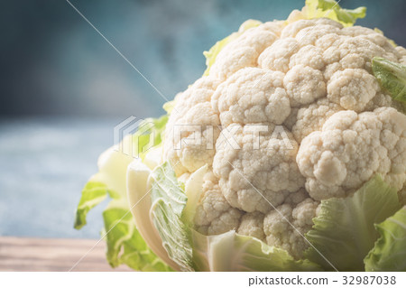 Organic cauliflower on gray background Organic cauliflower on gray background 32987038
