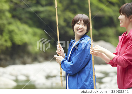 A woman enjoying fishing 32988241