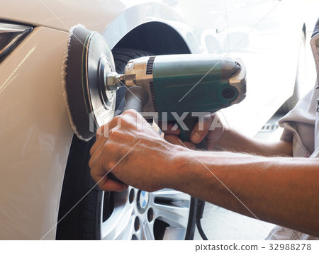 Paint image Hand of craftsman polishing with polisher Paint image Hand of craftsman polishing with polisher 32988278