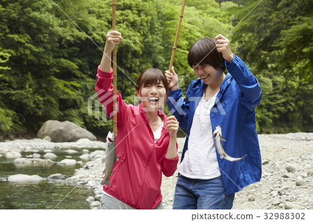 A woman enjoying fishing 32988302