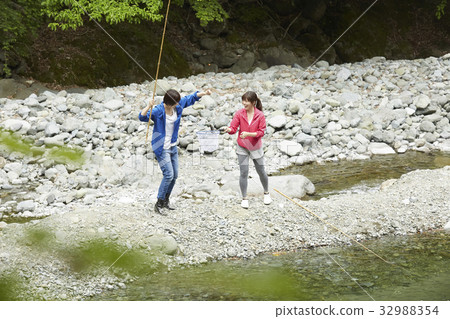 A woman enjoying fishing A woman enjoying fishing 32988354