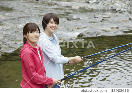 A woman enjoying fishing 32988616