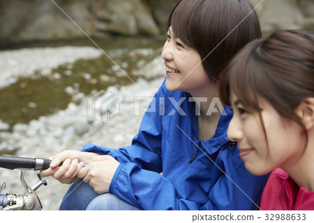A woman enjoying fishing 32988633