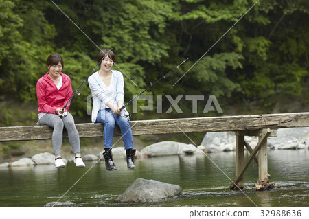 A woman enjoying fishing 32988636
