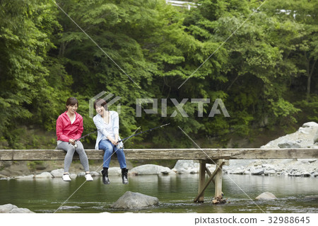 A woman enjoying fishing 32988645