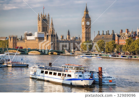 Big Ben  with boat in London, England, UK 32989096
