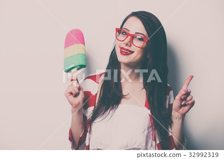 portrait of the young woman with toy portrait of the young woman with toy 32992319