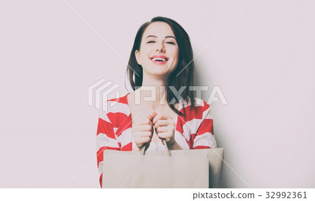 portrait of the young woman with shopping bags portrait of the young woman with shopping bags 32992361