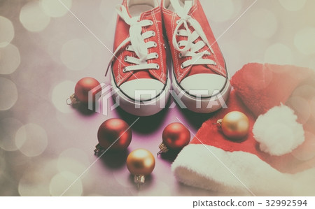 Gumshoes and Santas hat o 32992594