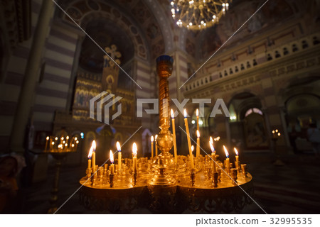 Candles int church Candles int church 32995535